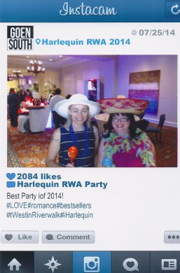 Jenn and I make use of the Instacam at the Harlequin party.